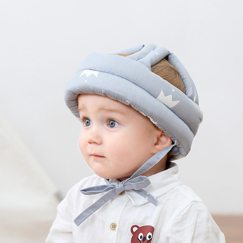 A Baby wearing a safety helmet for motor skills disorder